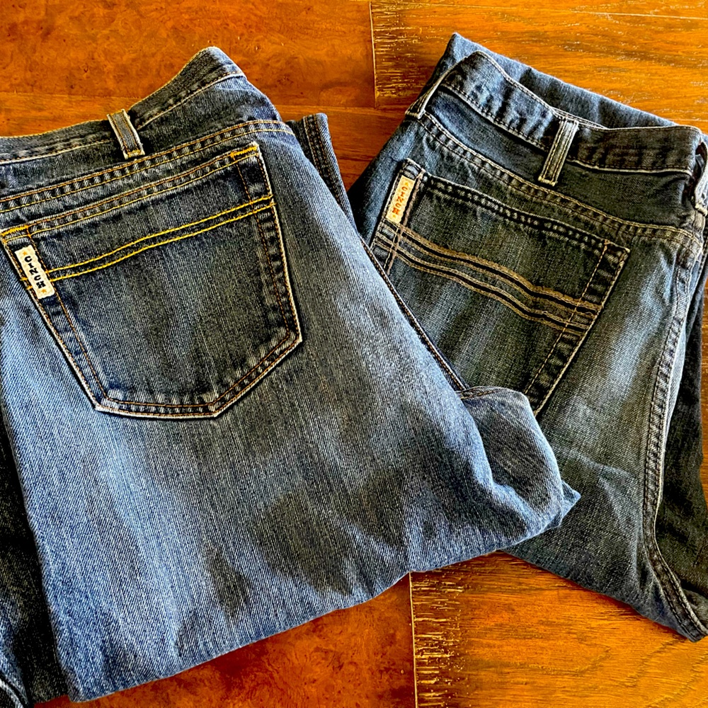 Two (2) pairs of Cinch jeans